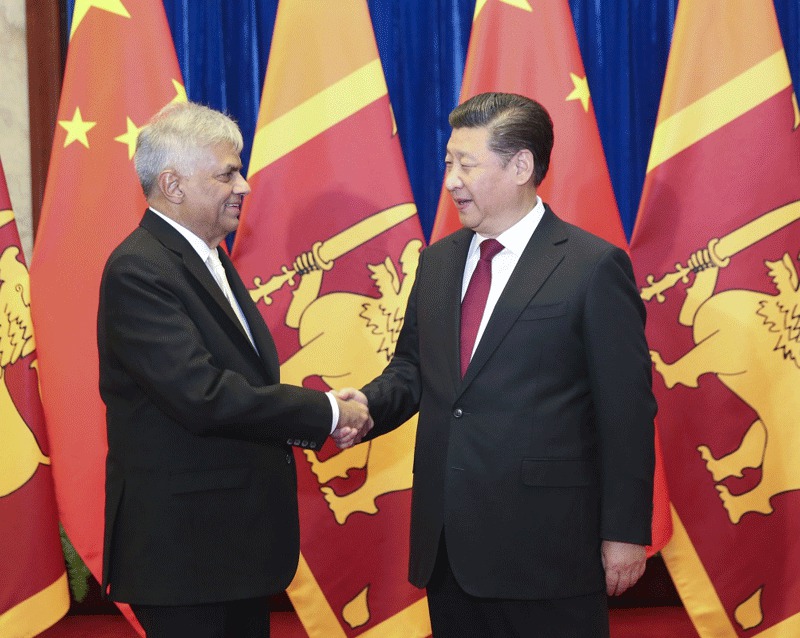 4月8日，国家主席习近平在北京人民大会堂会见斯里兰卡总理维克勒马辛哈。新华社记者 丁林 摄