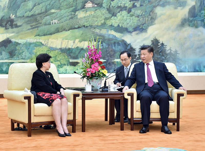 7月25日，國家主席習近平在北京人民大會堂會見世界衛生組織總干事陳馮富珍。 新華社記者 李濤 攝