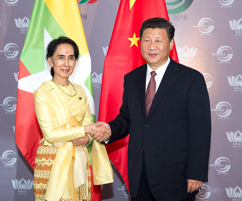 10月16日，國家主席習近平在印度果阿會見緬甸國務資政昂山素季。 新華社記者王曄攝