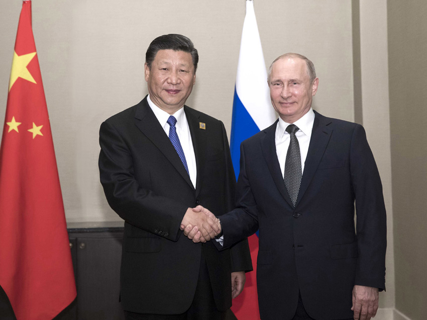 6月8日，國家主席習近平在阿斯塔納會見俄羅斯總統普京。 新華社記者蘭紅光 攝