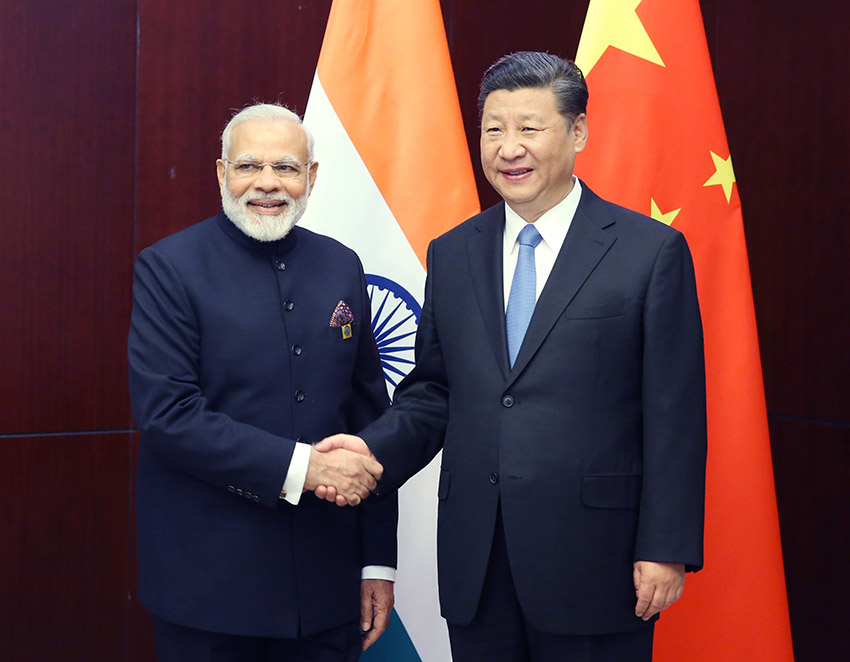 6月9日，國家主席習近平在阿斯塔納會見印度總理莫迪。 新華社記者姚大偉 攝