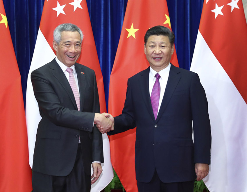 9月20日，国家主席习近平在北京人民大会堂会见来华进行正式访问的新加坡总理李显龙。新华社记者 谢环驰 摄