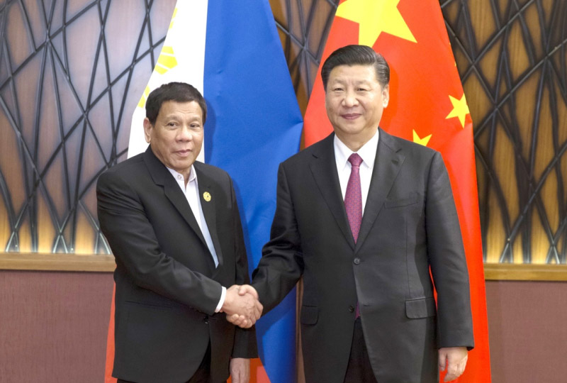 11月11日，國家主席習近平在越南峴港會見菲律賓總統杜特爾特。新華社記者 費茂華 攝