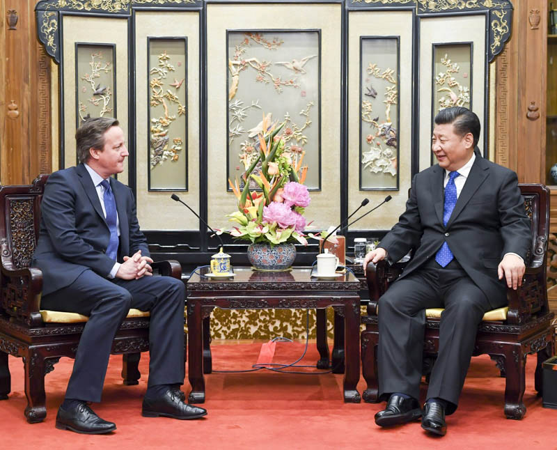 1月11日，國家主席習近平在北京釣魚台國賓館會見英國前首相卡梅倫。新華社記者李學仁攝
