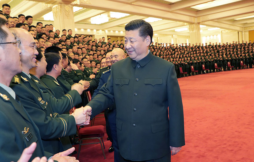 2月2日，中共中央總書記、國家主席、中央軍委主席習近平在北京接見武警部隊第三次黨代表大會全體代表。這是習近平同代表們親切握手。新華社記者 李剛 攝