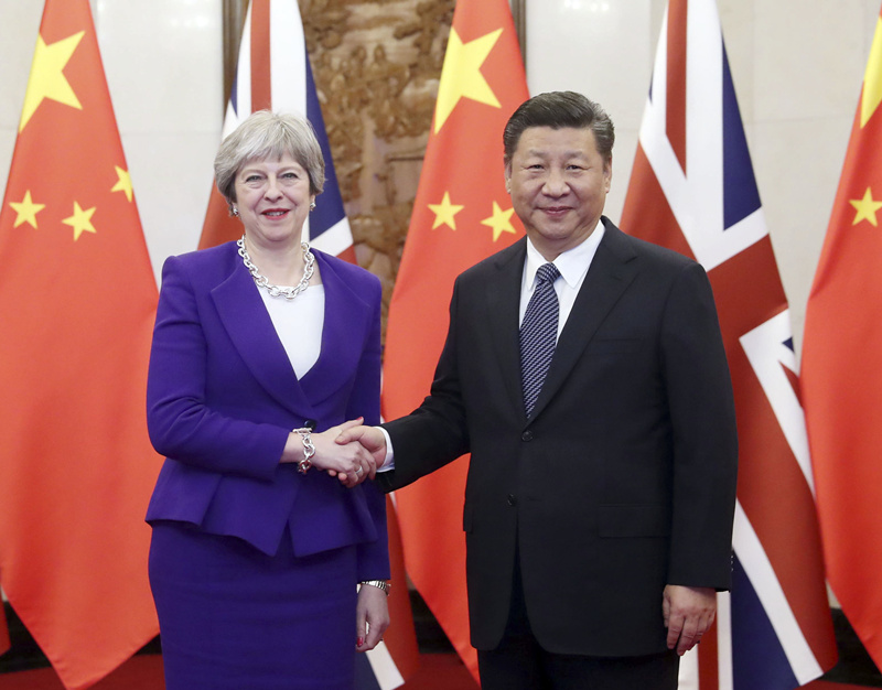 2月1日，國家主席習近平在北京釣魚台國賓館會見來華進行正式訪問的英國首相特雷莎·梅。新華社記者 劉衛兵 攝