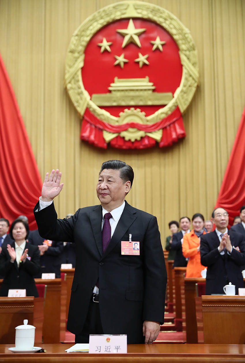 3月17日，十三屆全國人大一次會議在北京人民大會堂舉行第五次全體會議。習近平當選中華人民共和國主席、中華人民共和國中央軍事委員會主席。新華社記者 蘭紅光 攝