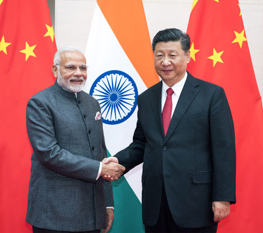 6月9日，國家主席習近平在青島會見印度總理莫迪。新華社記者李學仁攝