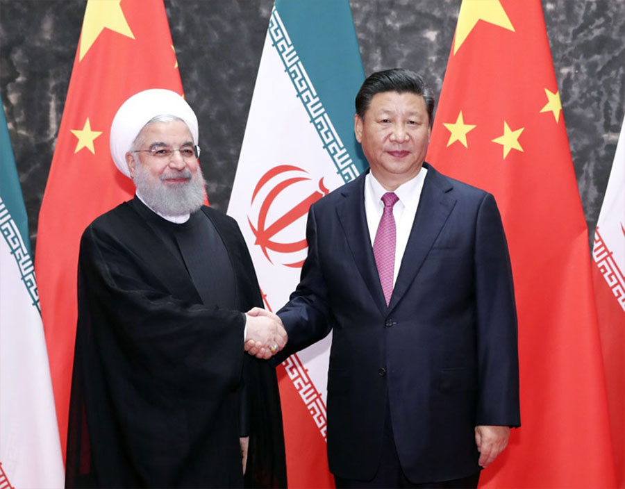 6月10日，國家主席習近平在青島同伊朗總統魯哈尼舉行會談。新華社記者 丁林 攝