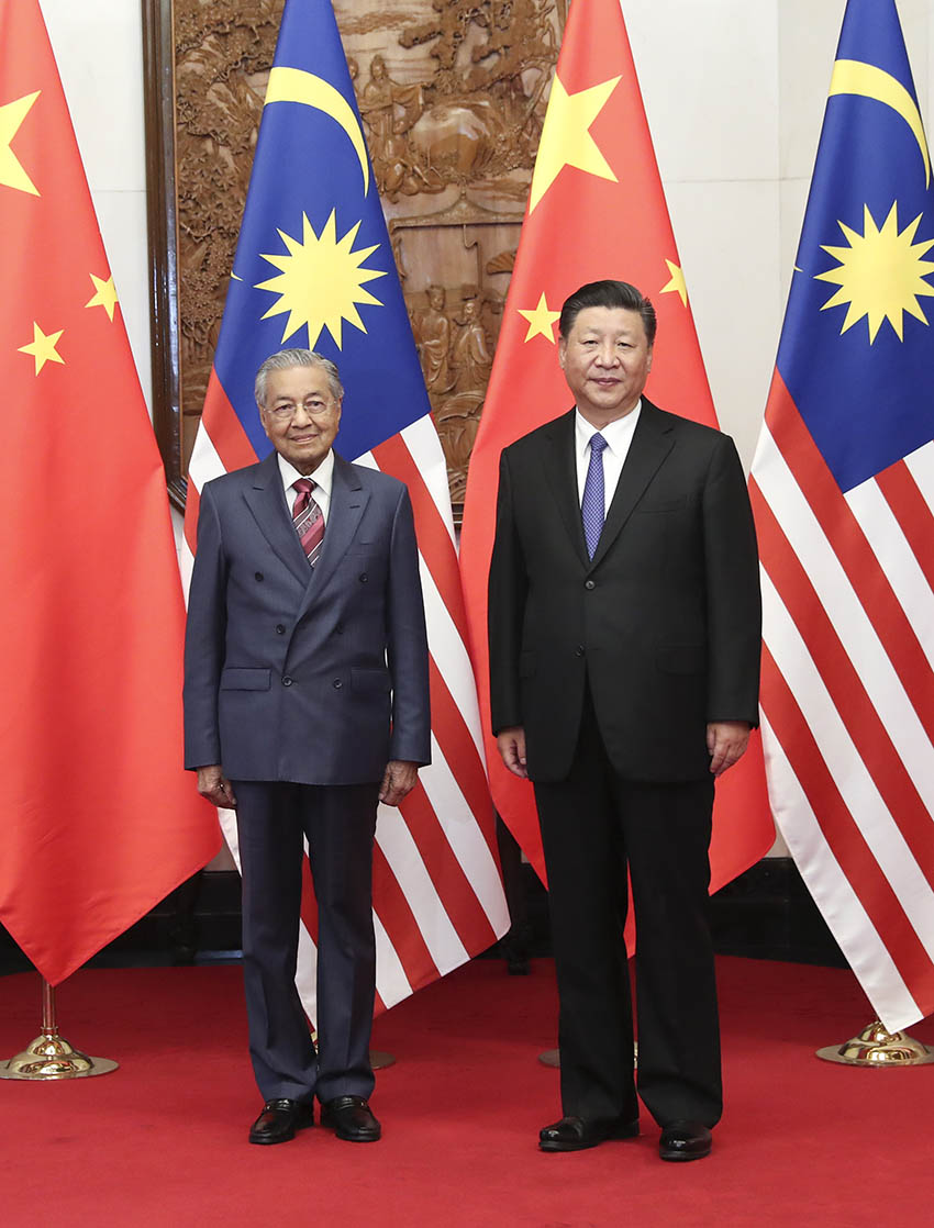 8月20日，國家主席習近平在北京釣魚台國賓館會見馬來西亞總理馬哈蒂爾。 新華社記者 龐興雷 攝