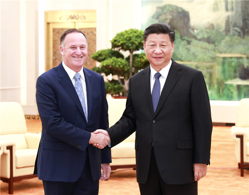 10月16日，國家主席習近平在北京人民大會堂會見新西蘭前總理約翰·基。 新華社記者 龐興雷 攝