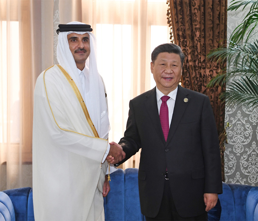 6月15日，國家主席習近平在杜尚別會見卡塔爾埃米爾塔米姆。 新華社記者 張領 攝