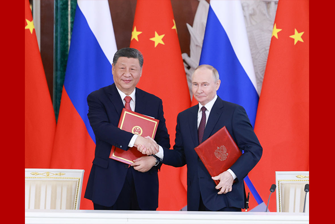 习近平同普京出席签字和合作文本交换仪式