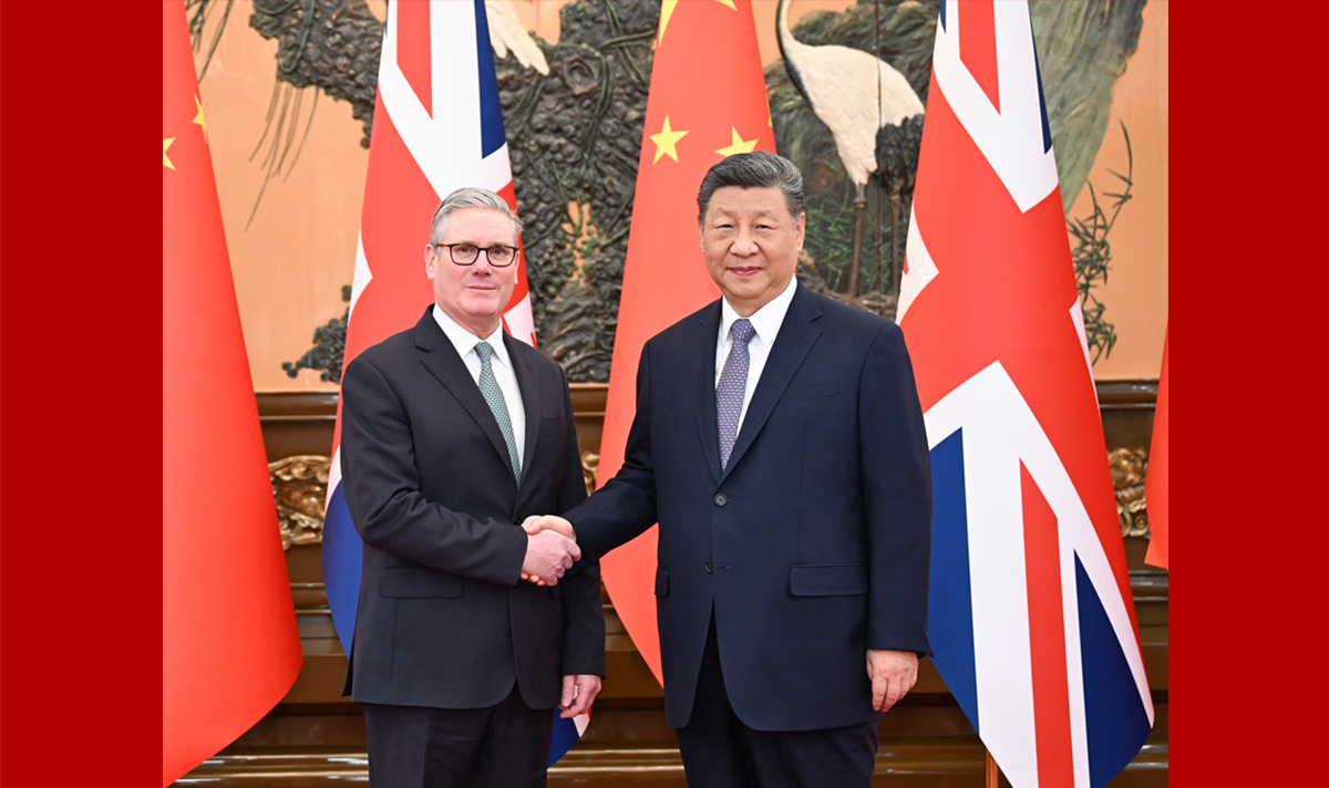习近平会见英国首相斯塔默