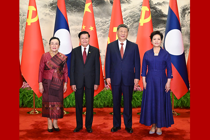 习近平同老挝人革党中央总书记、国家主席通伦会谈