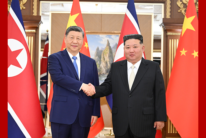 习近平同金正恩举行会谈