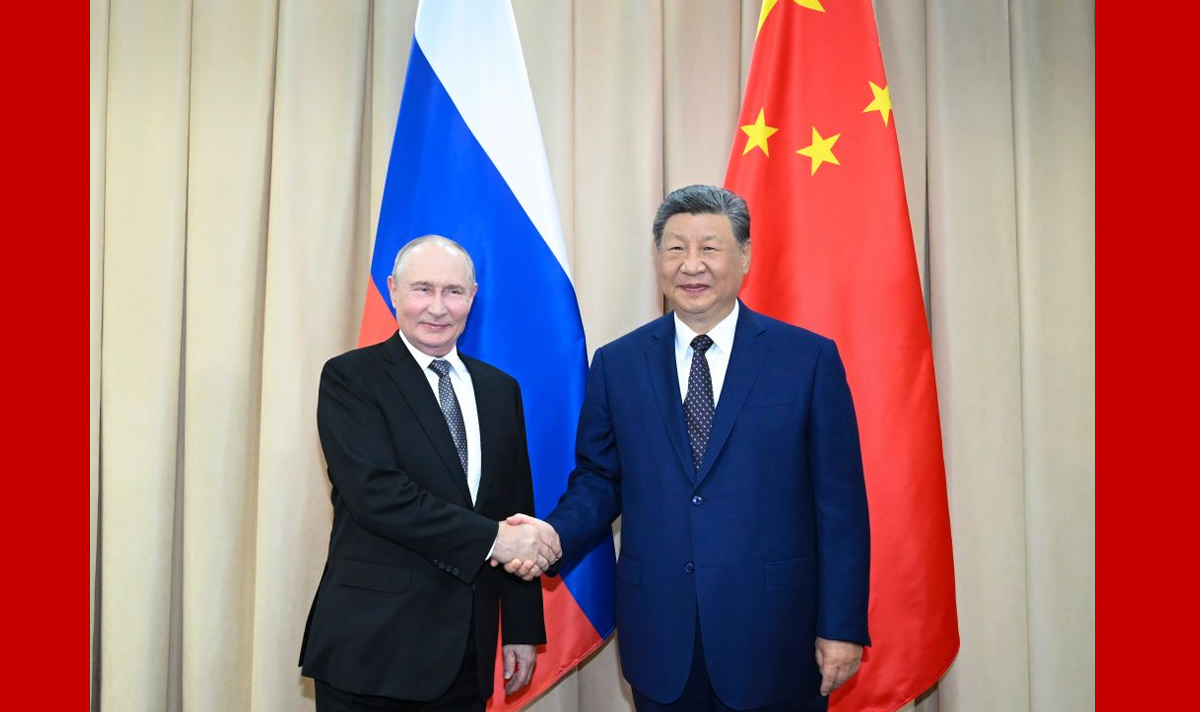 习近平会见俄罗斯总统普京