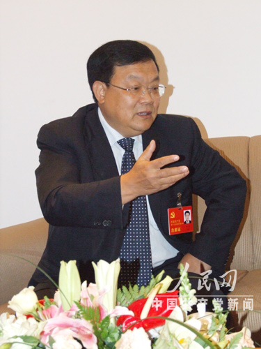 十七大代表,红塔集团董事长柳万东.王妍摄